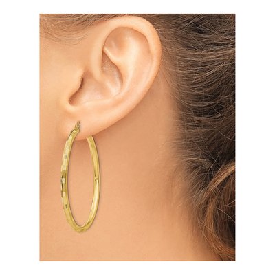 14K Yellow Gold 50mm Diamond-Cut Tube Hoop Earrings – view 4